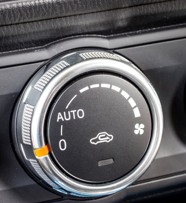 one of our experts working on a custom muffler